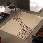 Tapis LOXTON Carving beige à motifs en peaux