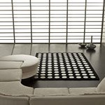 Tapis POMPONS Carving noir et blanc